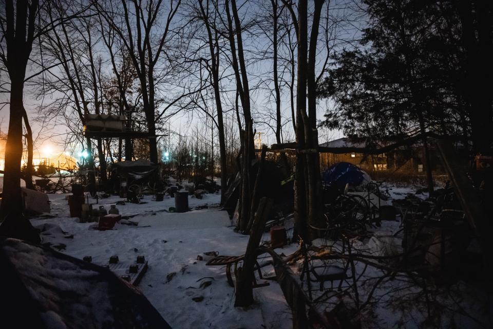 A snow covered homeless camp is seen behind a neighborhood on December 23, 2022 in Louisville, Kentucky (Getty Images)