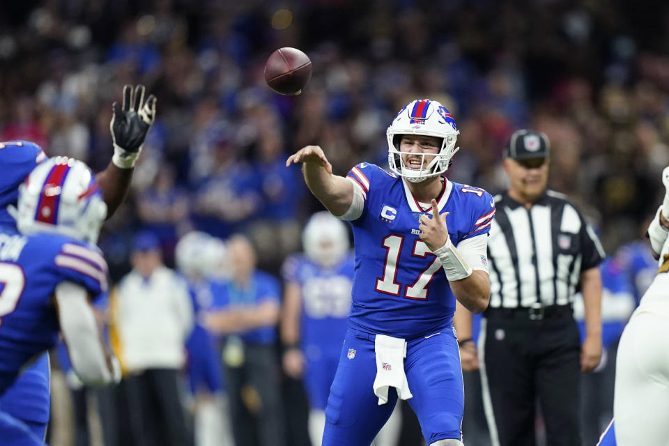 Buffalo Bills quarterback Josh Allen (17) passes in the first half of an NFL football game against the New Orleans Saints in New Orleans, Thursday, Nov. 25, 2021. (AP Photo/Derick Hingle)