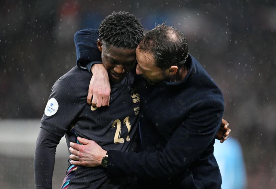 Kobbie Mainoo is greeted by Gareth Southgate after his impressive England debut (The FA via Getty Images)