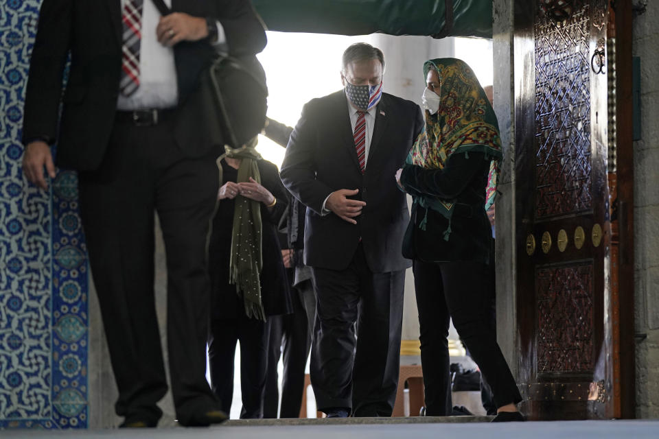 Secretary of State Mike Pompeo enters the Rustem Pasha Mosque in Istanbul, Tuesday, Nov. 17, 2020. Pompeo's stop in Turkey is focused on promoting religious freedom and fighting religious persecution, which is a key priority for the U.S. administration, officials said. (AP Photo/Patrick Semansky, Pool)