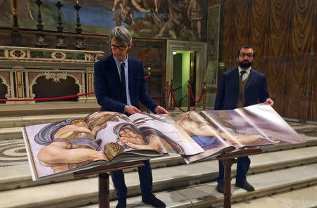 Two 1:1 scale photographic books depicting Sistine Chapel are seen during a news conference in the Sistine Chapel, the Vatican February 24, 2017. Picture taken February 24, 2017. REUTERS/Philip Pullella