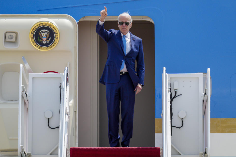 President Joe Biden gestures as he boards Air Force One at Andrews Air Force Base, Md., Wednesday, May 17, 2023, as he heads to Hiroshima, Japan to attend the G-7. (AP Photo/Jess Rapfogel)