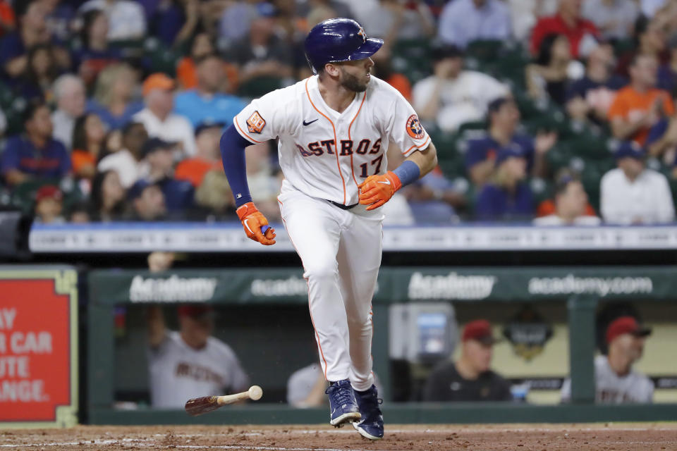 Houston Astros' David Hensley, watches his RBI single hit to left field, scoring Jose Altuve, during the fifth inning of a baseball game against the Arizona Diamondbacks Tuesday, Sept. 27, 2022, in Houston. (AP Photo/Michael Wyke)