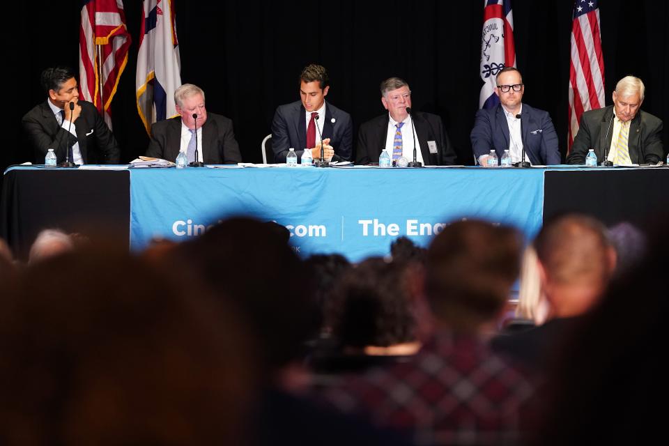 Cincinnati Mayor Aftab Pureval, Paul Muething, president of the Cincinnati Southern Railway Board of Trustees, State Rep. Dani Isaacsohn, who represents Ohio’s 24th House District, Alfred Nippert, Jr., a retired attorney who consulted on the acquisition of short-lines and serves on the board of directors for the Lebanon, Mason and Monroe Railroad; Adam Koehler, a member of the Save Our Rail group and Tom Brinkman, a former state lawmaker who recently brought a lawsuit against the railway board, serve as panelists for a town hall hosted by The Cincinnati Enquirer on the proposed sale of the Cincinnati Southern Railway to Norfolk Southern Corp, Tuesday, Oct. 3, 2023, at Union Terminal in Cincinnati. The Enquirer invited Norfolk Southern Corp. to be part of the forum, but the company declined.