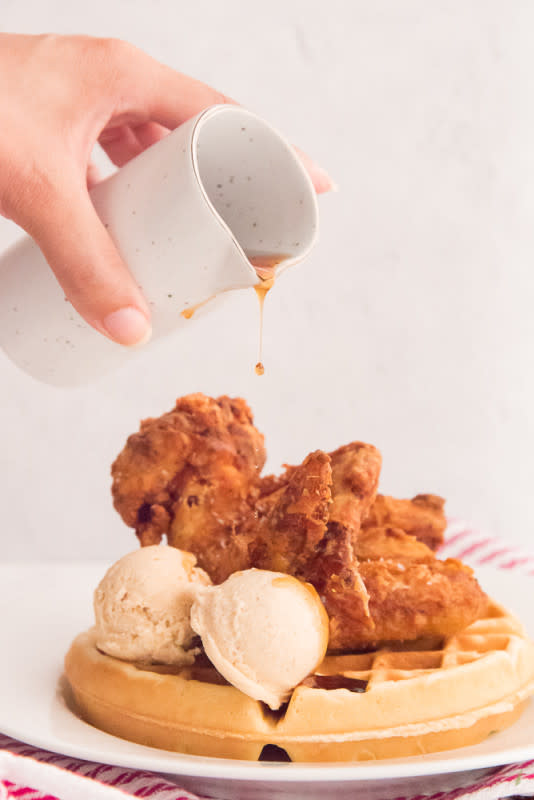 <p>Sense and Edibility</p><p>Chicken and Waffles is comfort food! Buttermilk marinated chicken served atop light, airy sweet cream waffles, are the perfect pair.</p><p><strong>Get the Recipe:</strong><a href="https://senseandedibility.com/chicken-waffles-honey-butter/" rel="nofollow noopener" target="_blank" data-ylk="slk:Chicken and Waffles with Honey-Cinnamon Butter;elm:context_link;itc:0;sec:content-canvas" class="link rapid-noclick-resp"> <strong>Chicken and Waffles with Honey-Cinnamon Butter</strong></a></p>