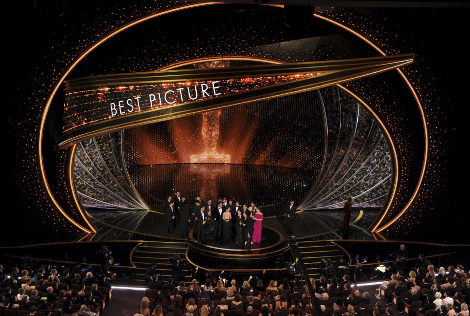 The cast and crew of "Parasite" accept the award for best picture at the Oscars on Sunday, Feb. 9, 2020, at the Dolby Theatre in Los Angeles. (AP Photo/Chris Pizzello)