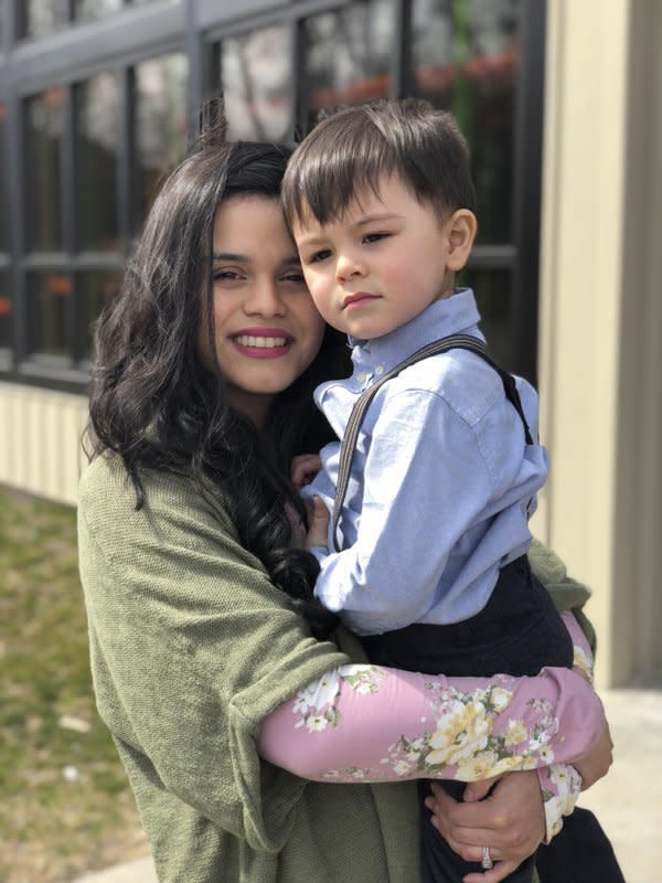 Katia Hills and her son. She says she's afraid to have another kid after the discrimination she faced at work the first time around. (Photo: Courtesy of the ACLU)