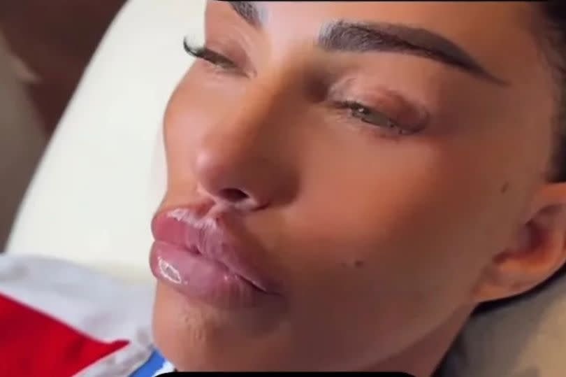 Katie Price pouting