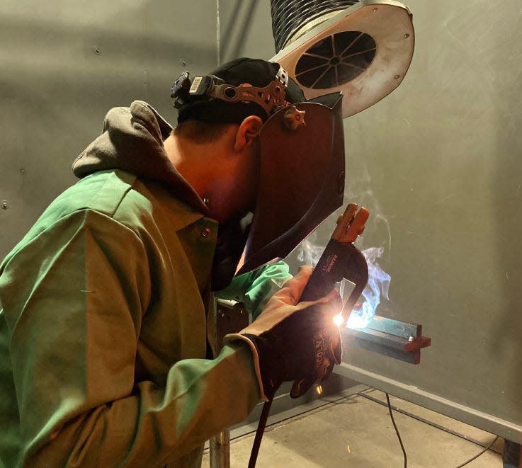 Brady Stucker, of Woodward-Granger, participates in the Plumbers & Steamfitters Local 33 High School State Welding Contest on Friday, April 26, 2024, in Des Moines.