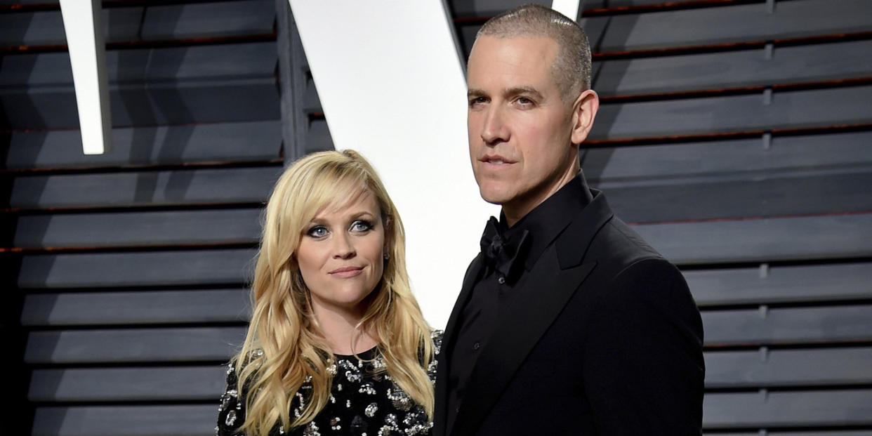 Reese Witherspoon and Jim Toth appear at the Vanity Fair Oscar Party in Beverly Hills, Calif. on Feb. 27, 2017.  (Evan Agostini / AP)