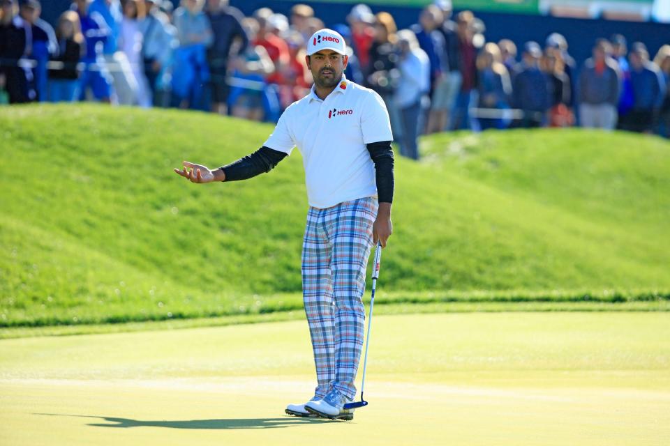 Anirban Lahiri reacts to a missed putt on 18 of the Players Stadium Course Monday, March 14, 2022, at TPC Sawgrass in Ponte Vedra Beach. Monday marked finishing third rounds and final rounds of golf for The Players Championship.