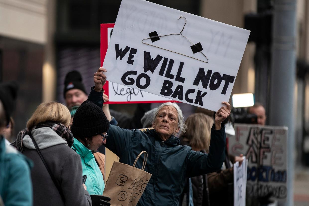 Abortion rights activists protest against the Supreme Court's decision to overturn of Roe v. Wade outside of the Theodore Levin U.S. Courthouse in Detroit on Tuesday, May 3, 2022.