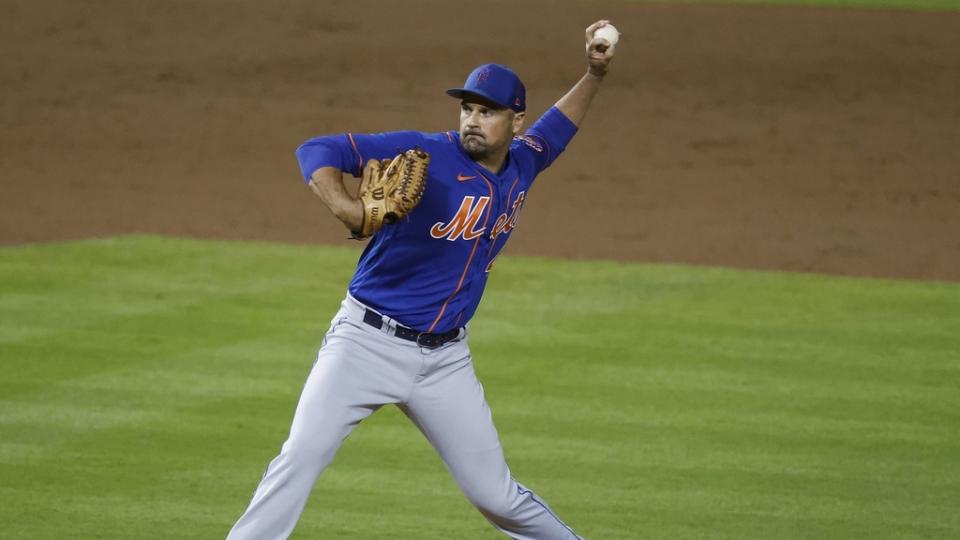 New York Mets pitcher T.J. McFarland (44) pitches against the Washington Nationals in spring training.