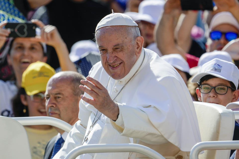 Pope Francis arrives to his weekly general audience in St. Peter's Square at The Vatican Wednesday, June 15, 2022. (AP Photo/Andrew Medichini)