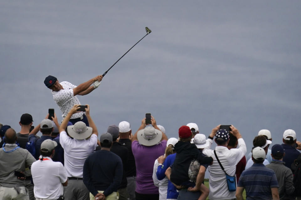 Bryson DeChambeau plays his shot from the fourth tee during the second round of the U.S. Open Golf Championship, Friday, June 18, 2021, at Torrey Pines Golf Course in San Diego. (AP Photo/Gregory Bull)