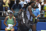 Coco Gauff, right, of the U.S. reacts as she walks from the court following her fourth round loss to compatriot Sofia Kenin, left, at the Australian Open tennis championship in Melbourne, Australia, Sunday, Jan. 26, 2020. (AP Photo/Andy Brownbill)
