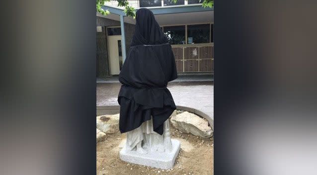 The statue was temporarily wrapped in a black sheet. Source: Instagram