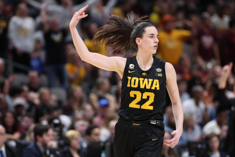 Iowa's Caitlin Clark celebrates making a 3-pointer against South Carolina during the Final Four of the NCAA women's tournament at American Airlines Center in Dallas on March 31, 2023. (Justin Tafoya/NCAA Photos via Getty Images)