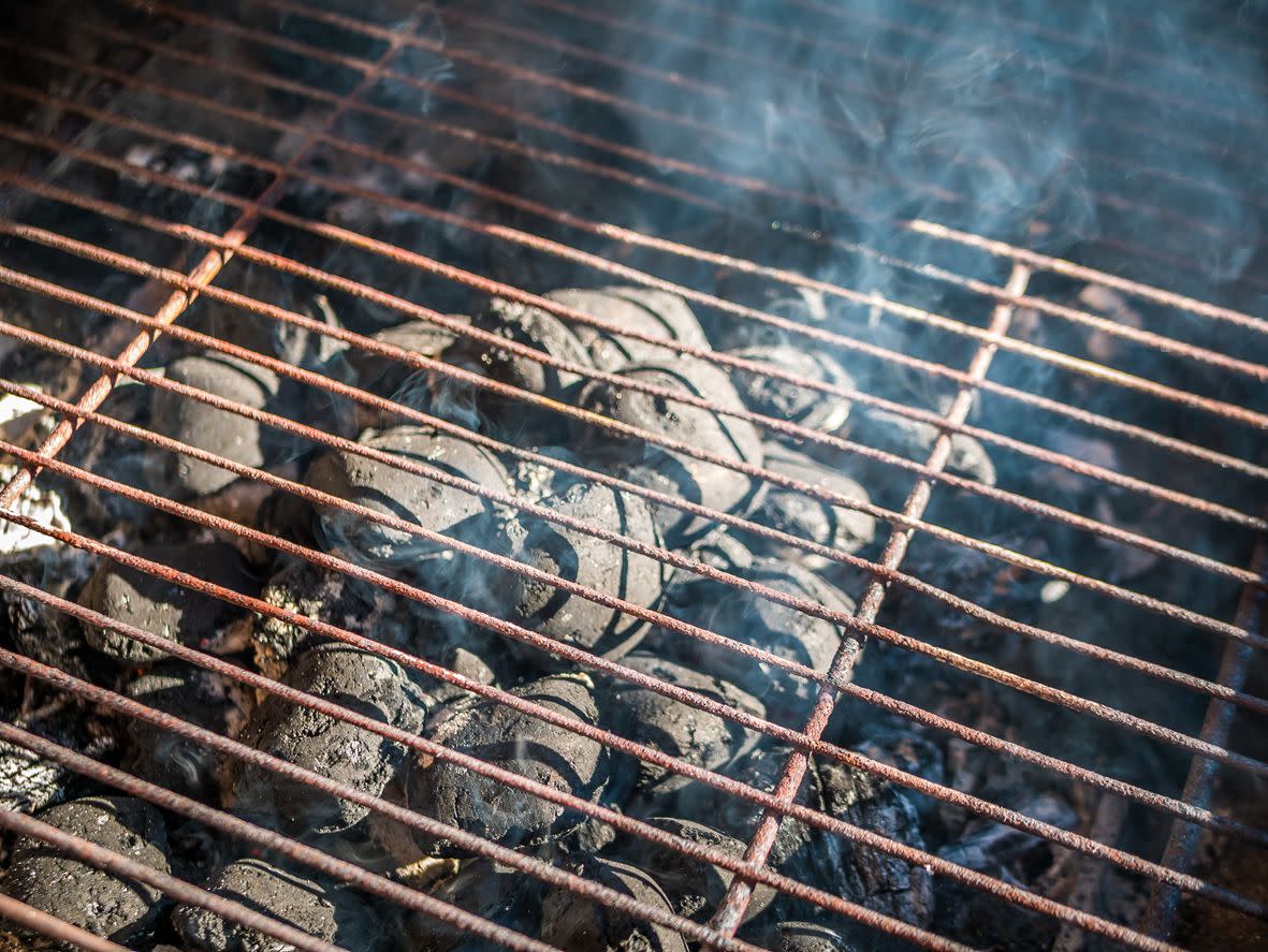 barbecue grate over white hot coals