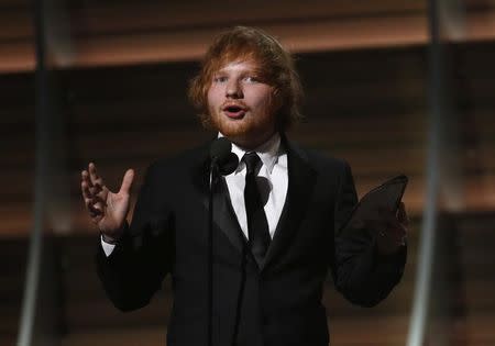 Ed Sheeran accepts the award for Song of the Year for "Thinking Out Loud" at the 58th Grammy Awards in Los Angeles, California February 15, 2016. REUTERS/Mario Anzuoni