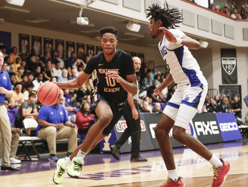 Dec 1, 2022; Montverde, Florida, USA; Montverde Academy forward Kwame Evans (10) drives the ball down court around IMG Academy forward Amier Ali (5) during the second quarter of the Sunshine Classic basketball tournament against Montverde Academy at Mills Championship Court on the campus of Montverde Academy. Mandatory Credit: Reinhold Matay-USA TODAY Sports