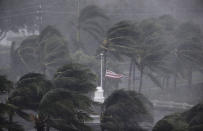 <p><strong>Naples</strong><br>An American flag is torn as Hurricane Irma passes through Naples, Fla., Sept. 10, 2017. (Photo: David Goldman/AP) </p>