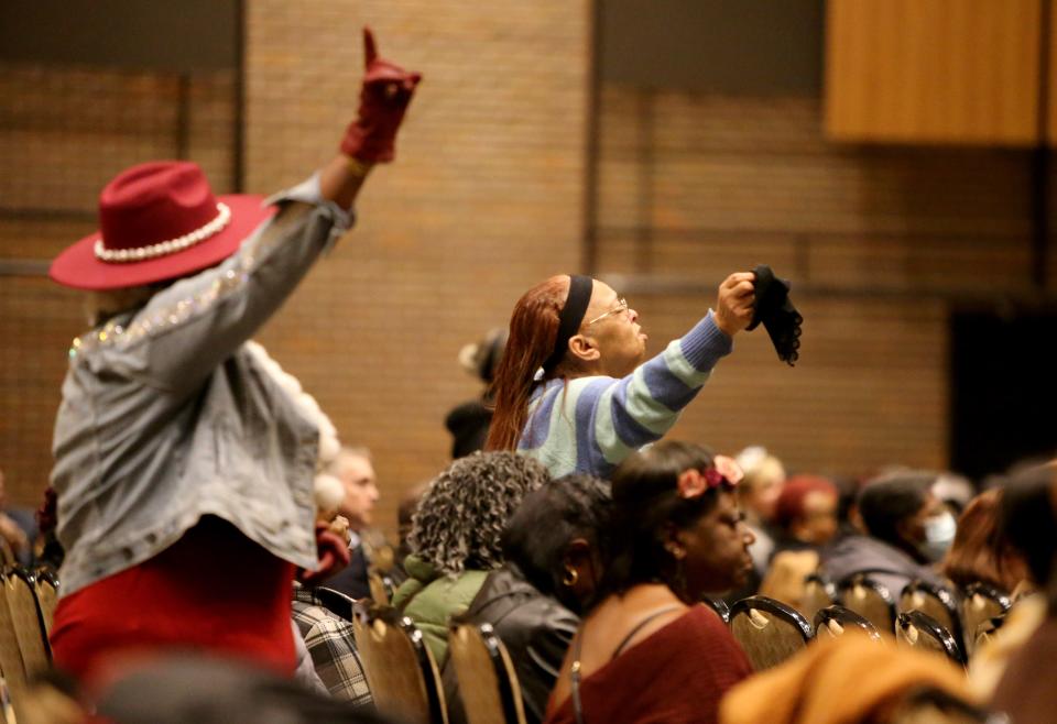 Those in attendance stand and react to a speaker Monday, Feb. 5, 2024, at a memorial service at Century Center in South Bend for the six Smith family children killed as a result of the Jan. 21, 2024, fatal house fire on North LaPorte Avenue.