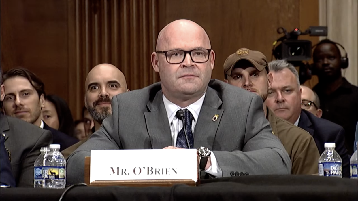 Sean O’Brien, the president of the International Brotherhood of Teamsters, sits at a Senate hearing.