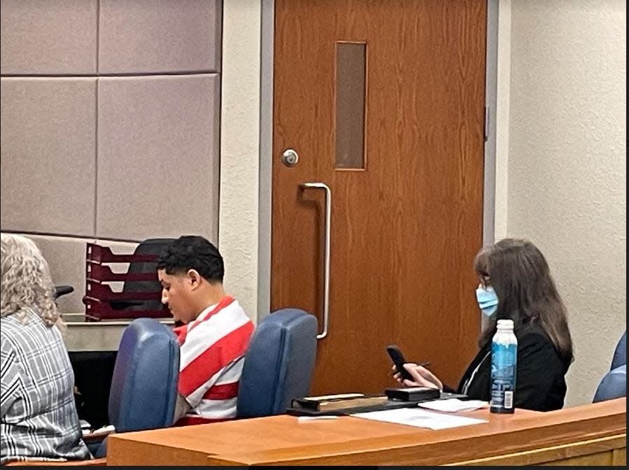 Melvin Arias, charged with second-degree murder in the shooting death of Milagros Guzman Lopez, appears in court for a pre-trial detention hearing on Thursday.