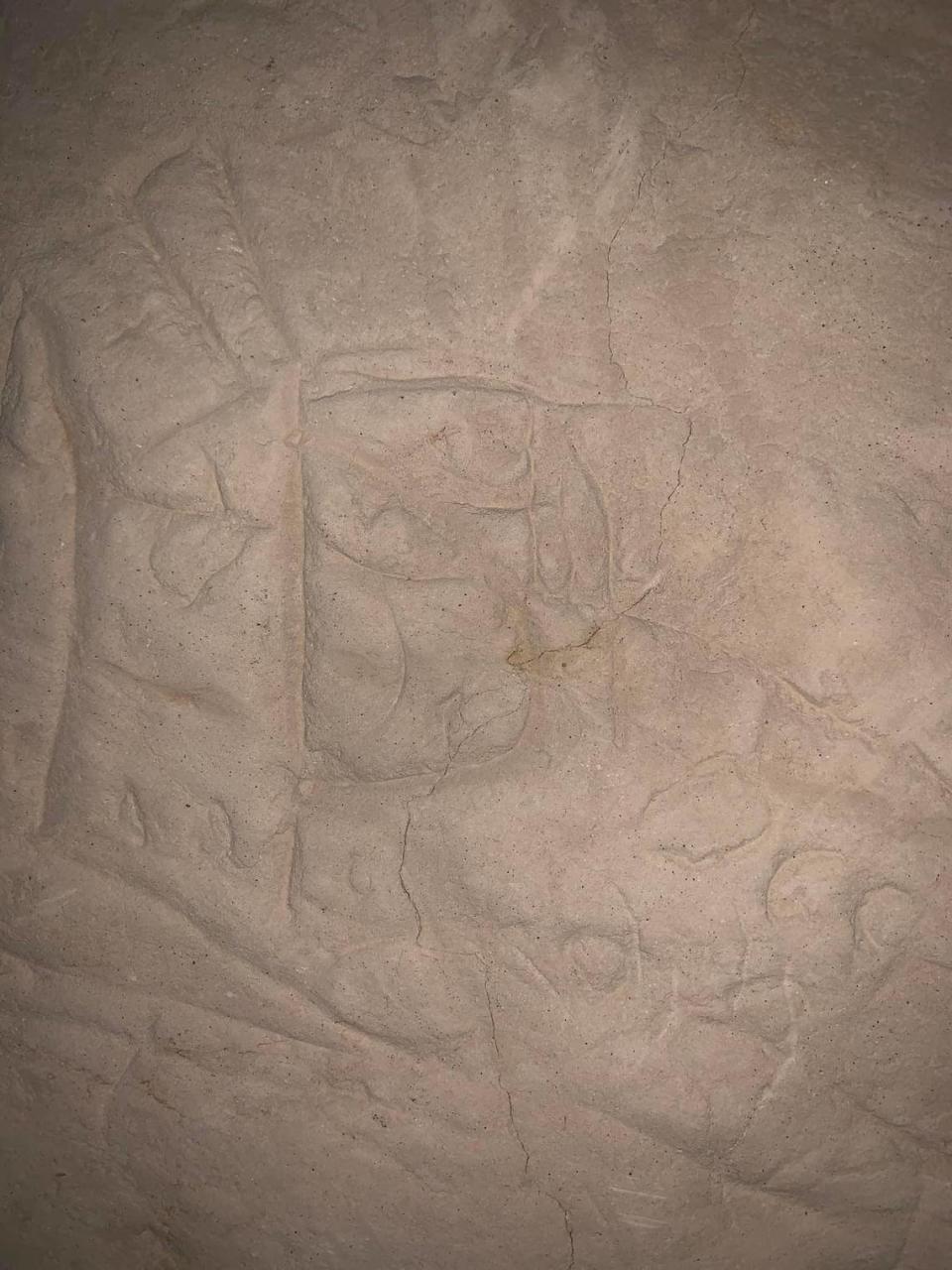 One of the carvings on the cave wall.