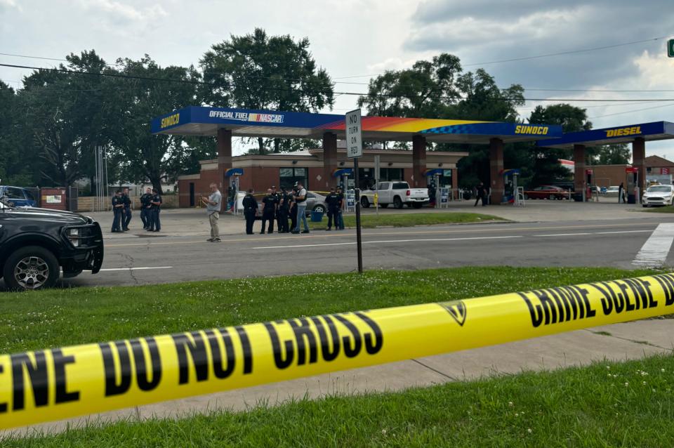 Police are seen near a Sunoco gas station on Sunday, July 21, 2024.