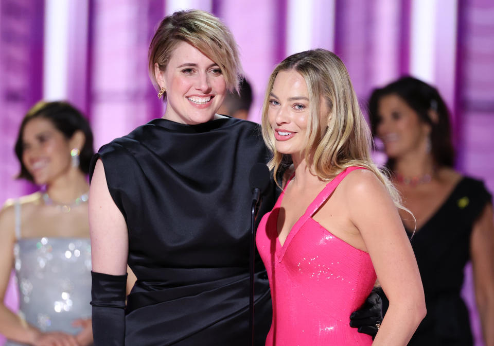 (L-R) Greta Gerwig and Margot Robbie win the Cinematic and Box Office Achievement for ‘Barbie’