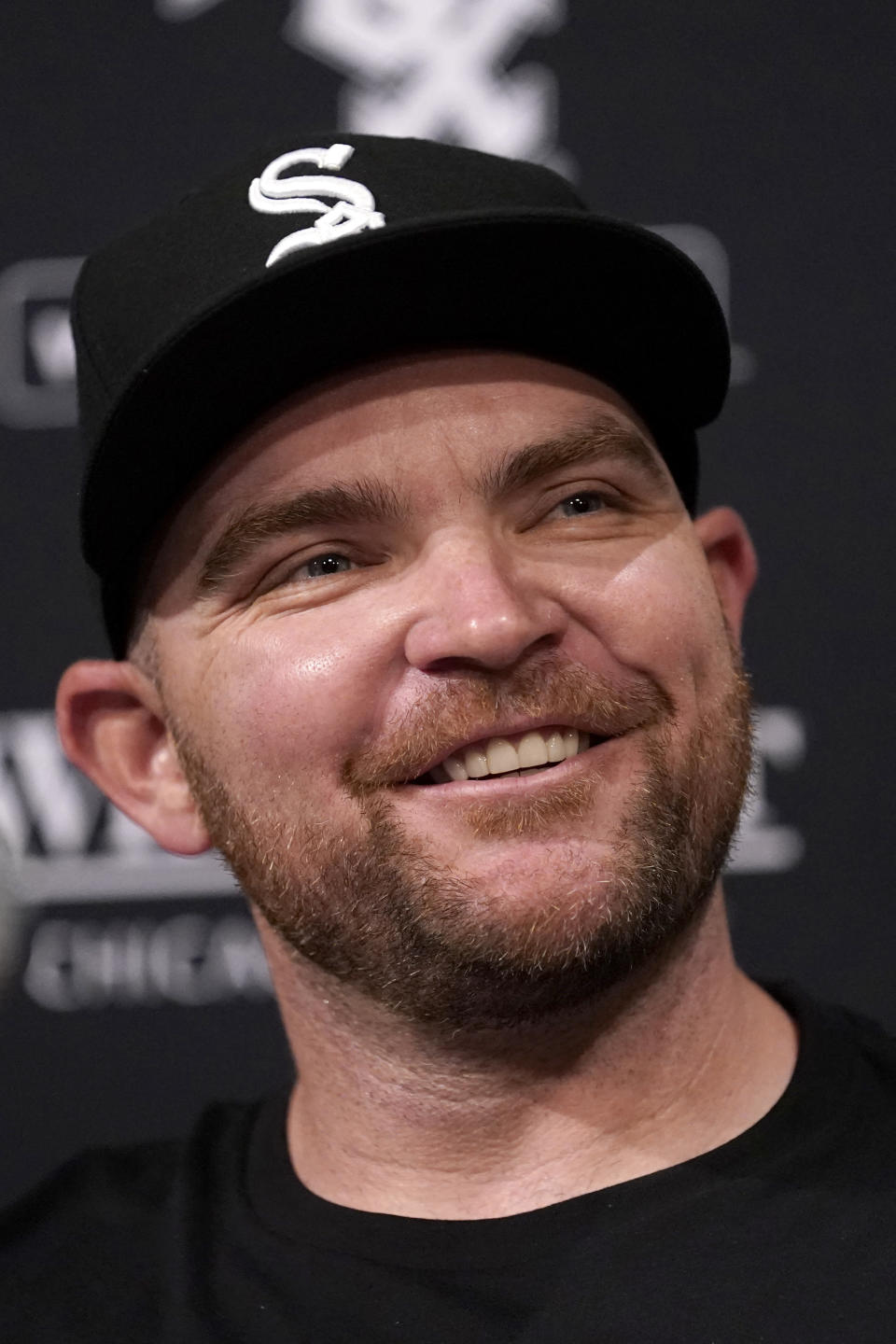 Chicago White Sox's Liam Hendriks smiles as he talks to reporters before a baseball game between the White Sox and the Minnesota Twins on Wednesday, May 3, 2023, in Chicago. (AP Photo/Charles Rex Arbogast)