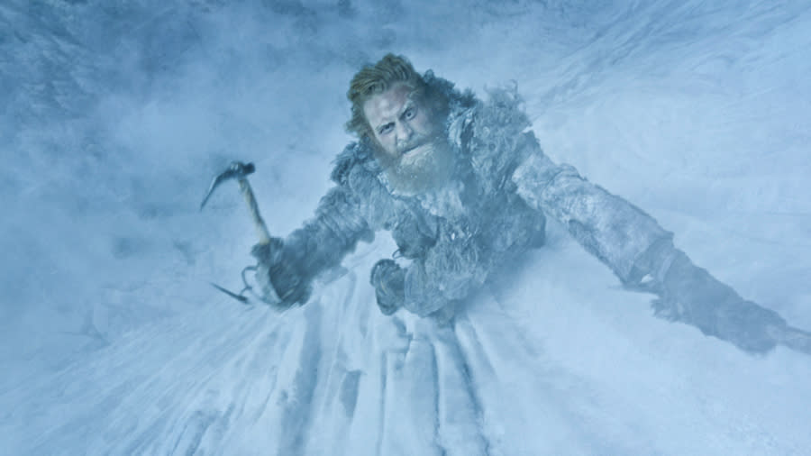 Kristofer Hivju as Tormund Giantsbane attempts to scale The Wall. (HBO)