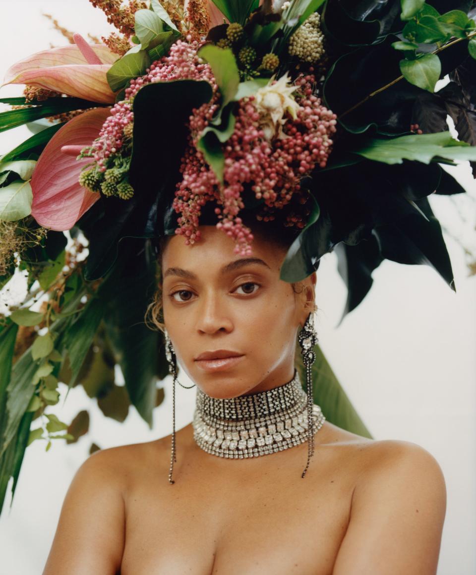 Floral headdress by Phil John Perry for Rebel Rebel. Erickson Beamon earrings. Lynn Ban necklaces.<br> <em>Fashion Editor: Tonne Goodman.</em>