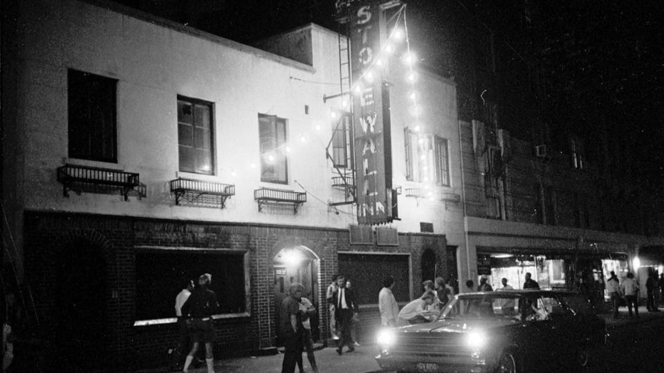 Stonewall Bar 1969, Scenes at Christopher St. and 7th Ave. South with police trying to clear crowds.