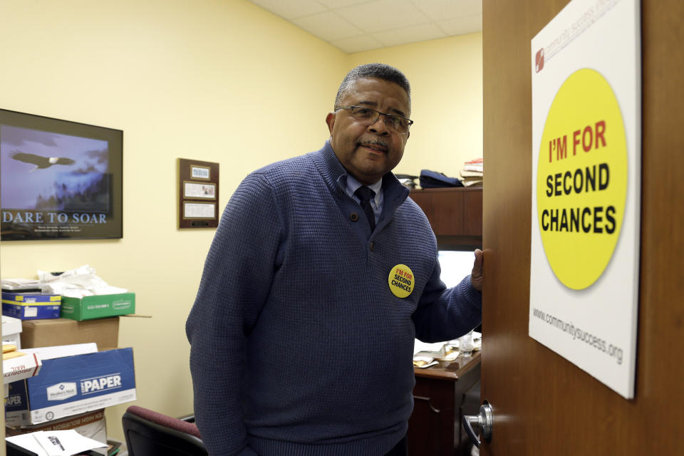 In this photo taken Wednesday, Dec. 18, 2019 Dennis Gaddy, the co-founder of the Raleigh-based Community Success Initiative, is shown at the door to his office in Raleigh, N.C. Gaddy, 62, served time behind bars and said he was unable to vote for seven years after being released from prison because he was on probation. (AP Photo/Gerry Broome)