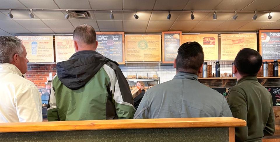 People stand in line to order their lunch at The Works on Congress Street in Portsmouth, where some will sit down to eat and others will take it to go Wednesday, Nov. 15, 2023.