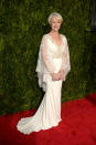 <p>At the 2015 Tony Awards, Mirren looked enchanting in this white plunging gown with a lace neckline and billowing sheer sleeves.</p>