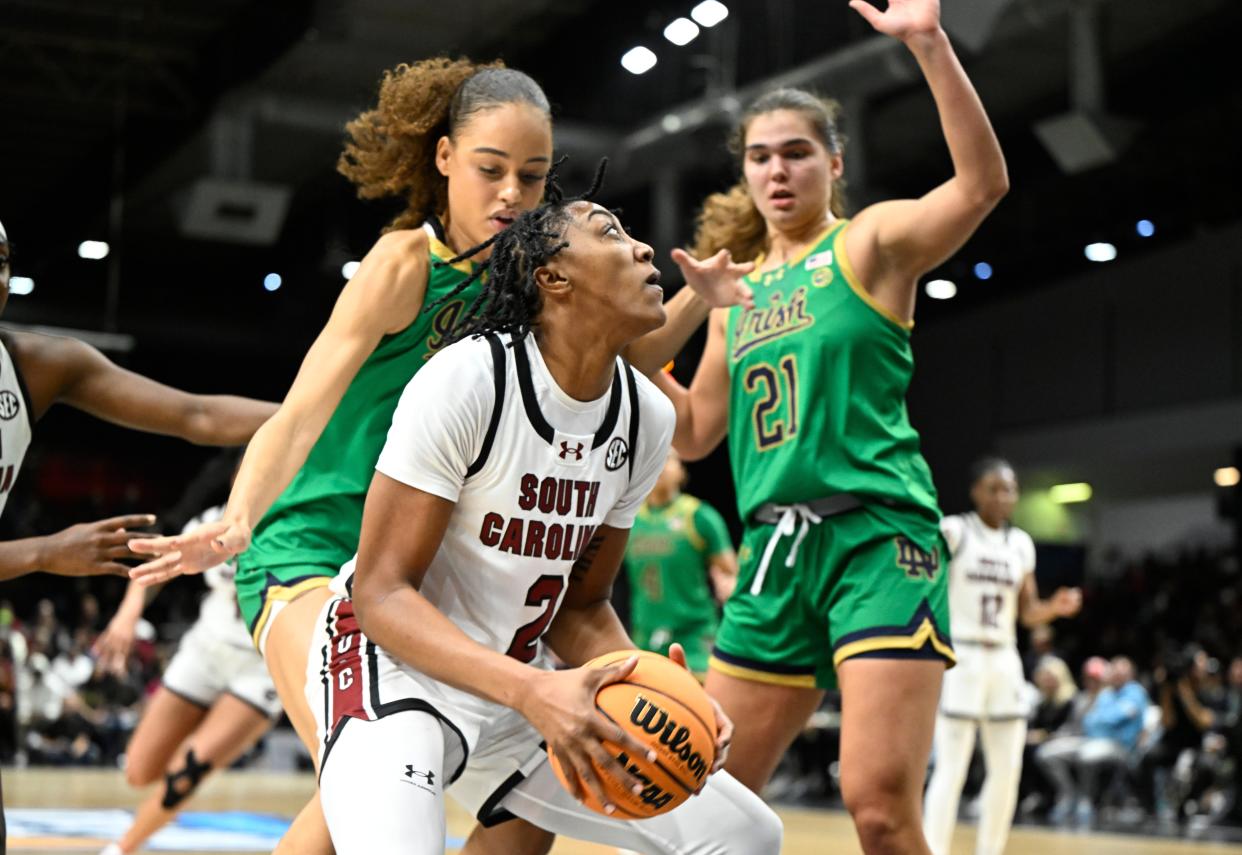 Nov 6, 2023; Paris, FRANCE; South Carolina Gamecocks forward Ashlyn Watkins (2) drives to the basket against Notre Dame Fighting Irish forward Maddy Westbeld (21) in a women's college basketball game at Halles Georges Arena. Mandatory Credit: Stephane Mantey/Presse Sports via USA TODAY Sports