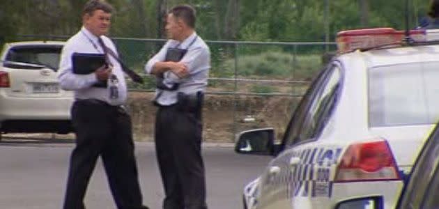 Police investigate scene after officers open fire on man allegedly armed with knives.  Photo: 7News