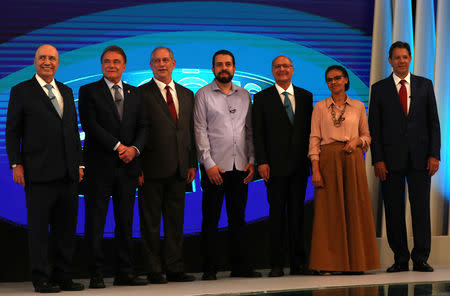Presidential candidates pose ahead of a televised debate in Rio de Janeiro, Brazil October 4, 2018. REUTERS/Ricardo Moraes