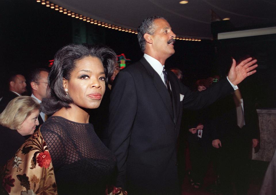 Oprah Winfrey arrives at the Los Angeles premiere of the film "Beloved" with her partner Steadman Graham at Mann's Theater in Los Angeles in 1998.