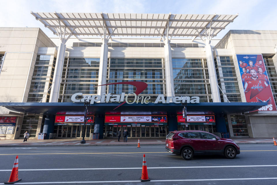 Capitol One Arena is shown before an NHL hockey game between the Washington Capitals and the New Jersey Devils, Tuesday, Feb. 20, 2024, in Washington. The proposed move of the Capitals and Wizards sports teams to nearby Virginia has stoked concern in a pair of fragile Washington neighborhoods. Residents and business owners in Chinatown fear that the departure of the teams would devastate the neighborhood around the Capital One Arena. (AP Photo/Alex Brandon)