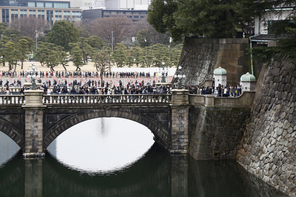 People attend Japan's Emperor Naruhito's 63rd birthday celebration at the Imperial Palace in Tokyo, Thursday, Feb. 23, 2023. (Rodrigo Reyes Marin/Pool Photo via AP)