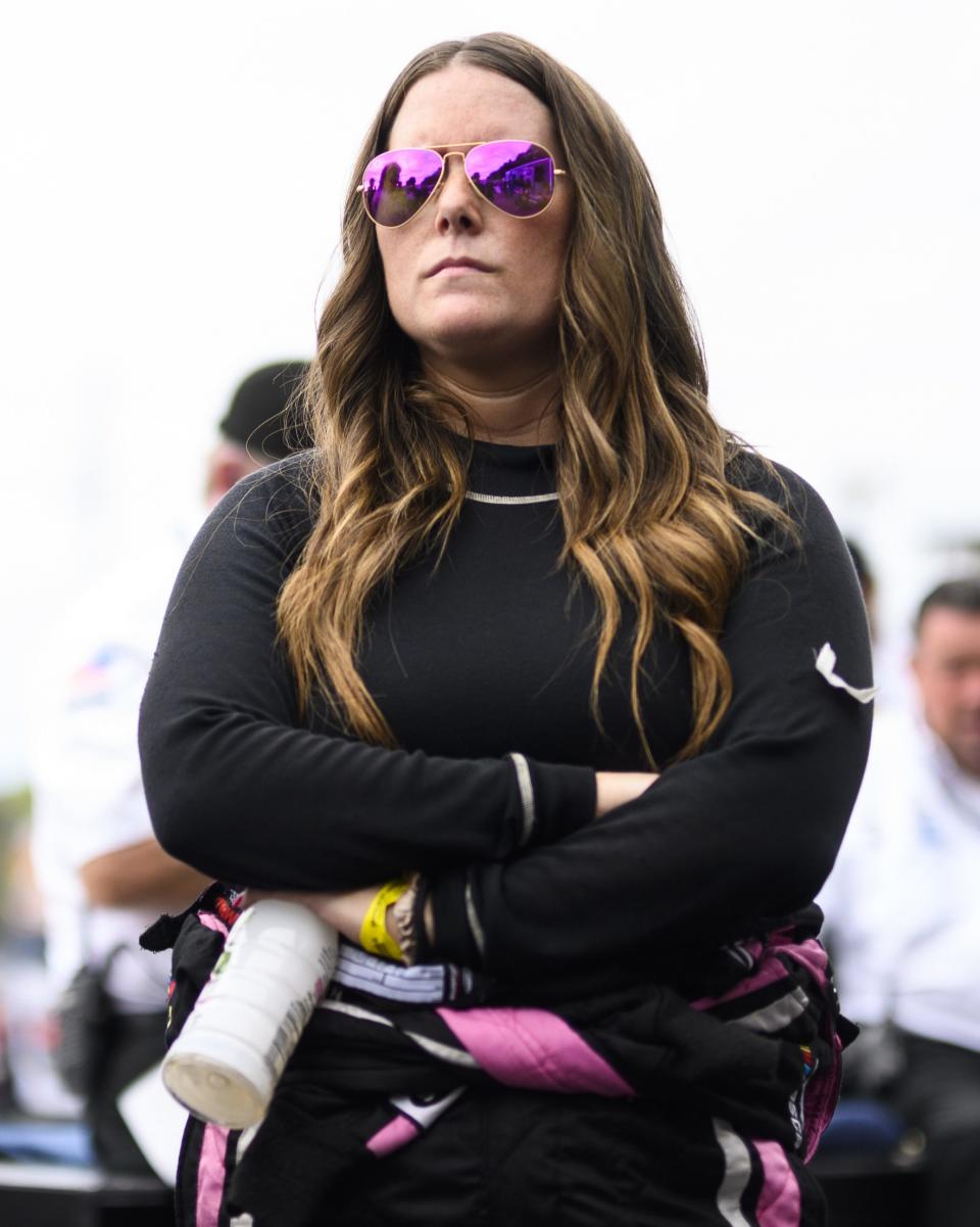 Melissa Fifield, driver of the #01 Pine Knoll Auto Sales, listens during the driver meeting during the Eddie Partridge 256 for the Whelen Modified Tour at Riverhead Raceway on September 17, 2022 in Riverhead, New York. (Mike Lawrence/NASCAR)