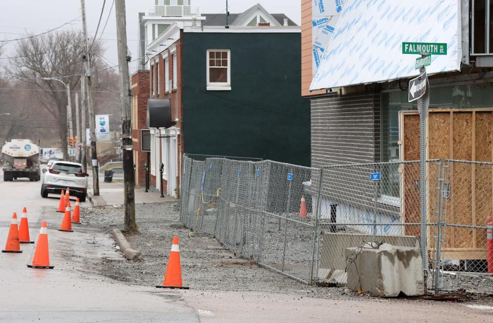 NSCC's contractor opened up a section of sidewalk after blocking it for at least two years, which a spokesperson says demonstrates CBRM is listening to business owners.