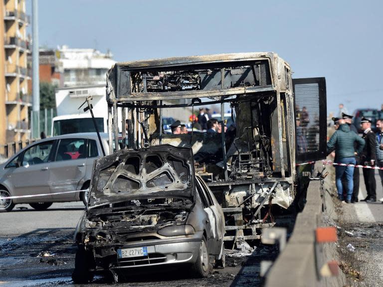 Italy bus fire: Driver abducts 51 children and sets vehicle alight in protest over refugee drownings