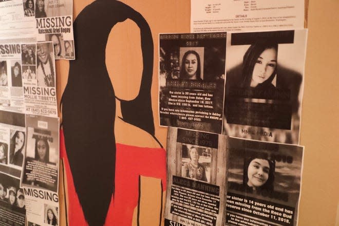 Signs hang for missing indigenous women during the rehearsal for a play at Sherman Indian High School in Riverside, Calif. on August 23, 2019.