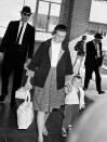<p>Marina Oswald, wife of Lee Harvey Oswald, arrives with her daughter, June, at the Parkland Hospital in Dallas, Texas, where her husband died after being fatally shot by nightclub owner Jack Ruby, on Nov. 24, 1963. (Photo: AP) </p>